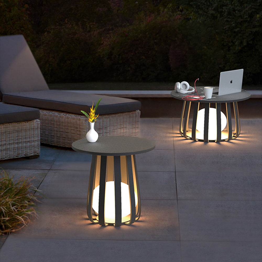 Table basse lumineuse d’extérieur à corps ajouré en métal — Réglisse
