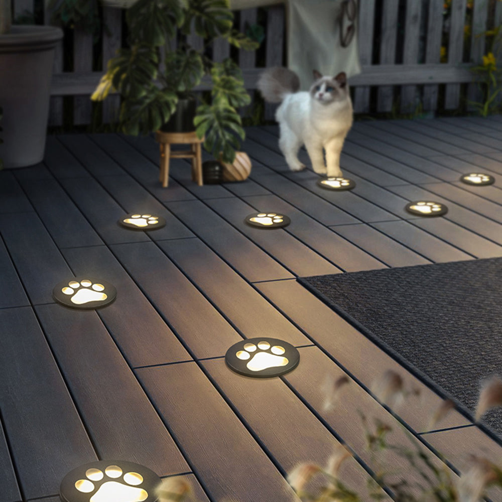 Spot de sol encastré en métal motif patte de chat — Gaufrure