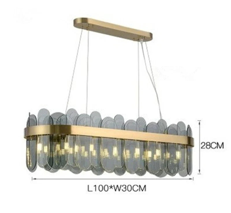 lustre ovale en métal doré avec abat-jour en verre suspendu