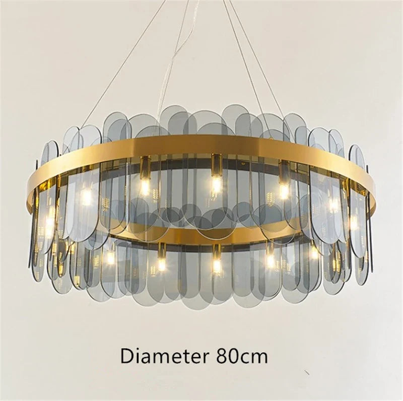 lustre ovale en métal doré avec abat-jour en verre suspendu