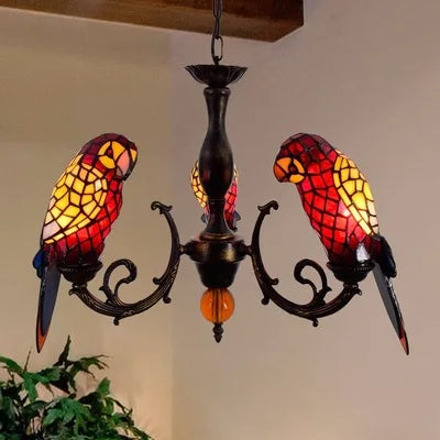 applique murale design en verre coloré motif perroquet