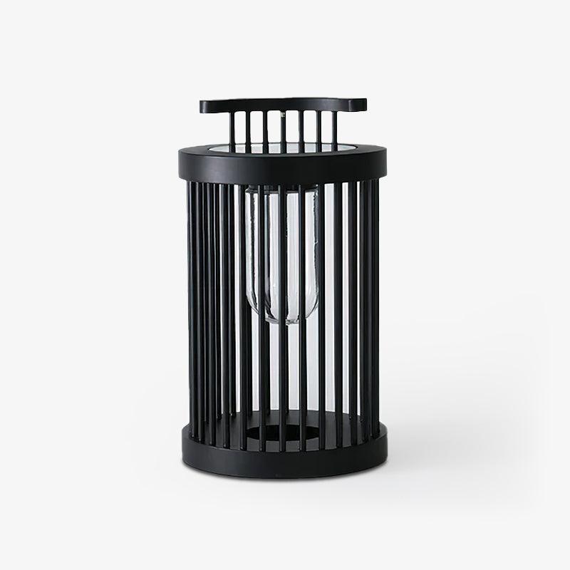 Lanterne d’extérieur cylindrique à barreaux en acier noir — Héliotrope