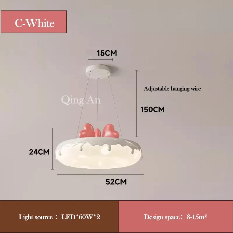 lustre en forme de donut avec nœud rose pour décoration enfantine