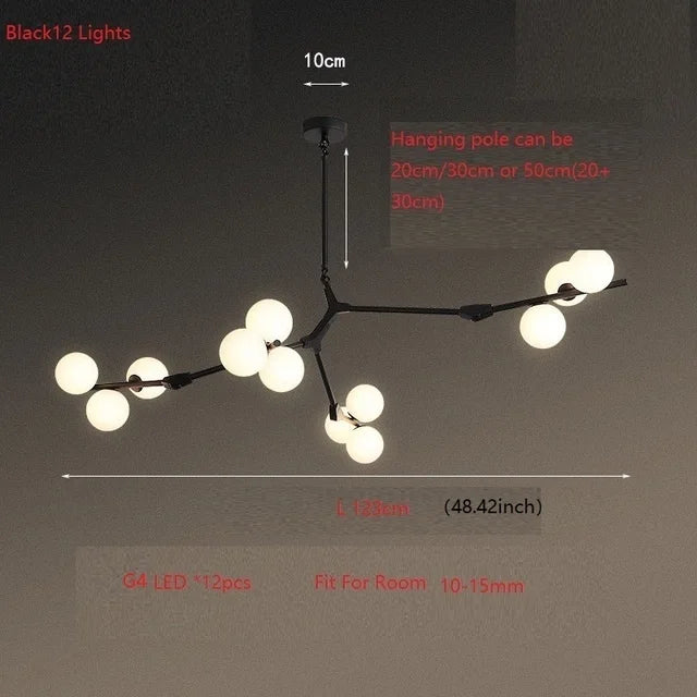 lustre en verre avec branches d'arbre et boules lumineuses