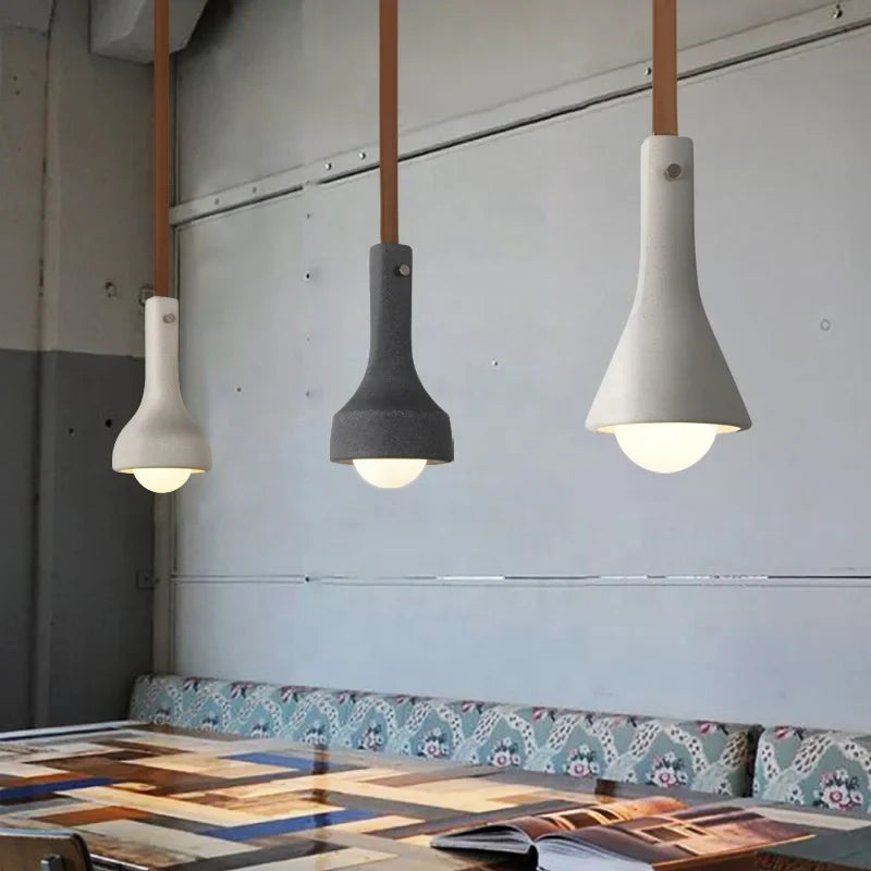 suspension industrielle en cuir et ciment style rétro pour bar