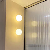 lampe boule de verre moderne avec base dissimulée pour divers usages
