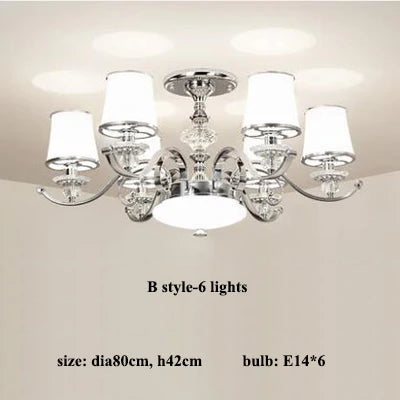 lustre chromé moderne à abat-jours blancs