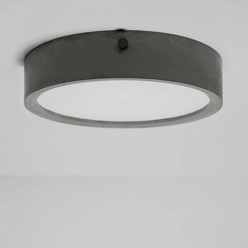 plafonnier rond en ciment style industriel pour intérieur