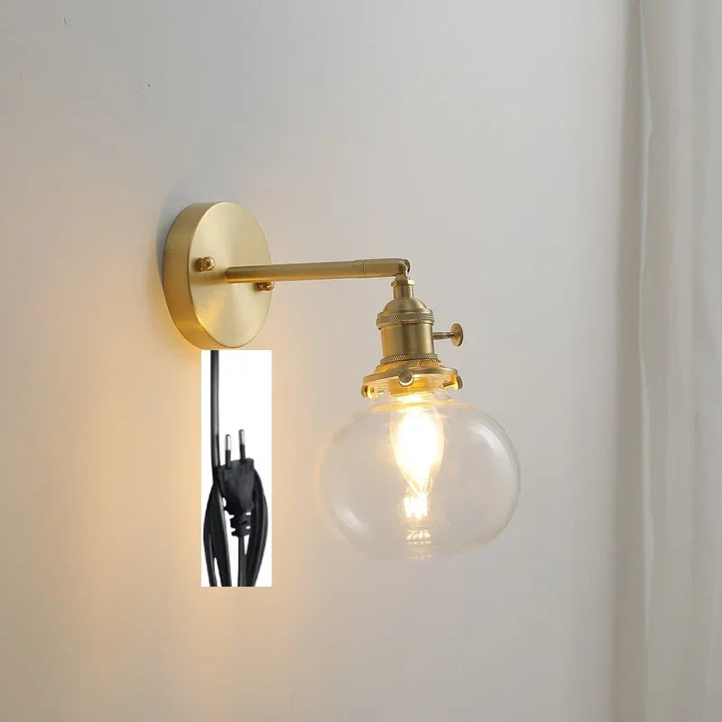 applique murale moderne avec chaîne de traction et boule de verre