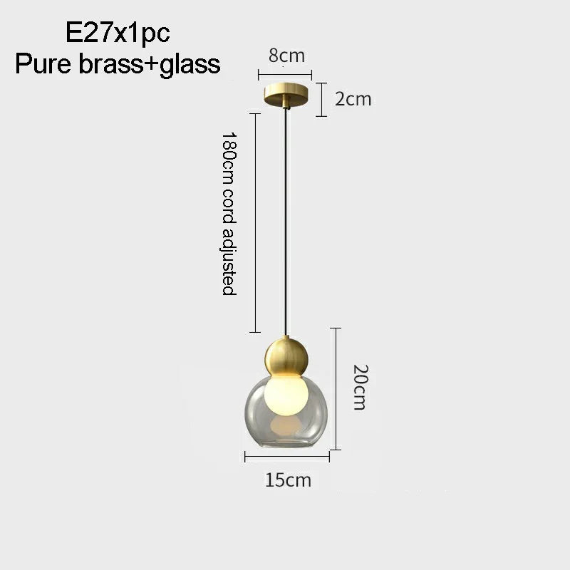 suspension en verre transparent avec tête en cuivre décorative