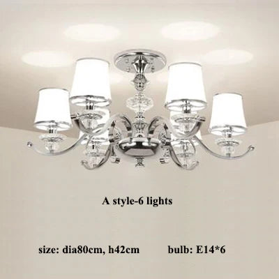lustre chromé moderne à abat-jours blancs