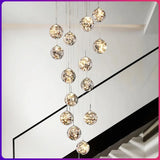 lustre moderne en colimaçon avec éclairage led et boule de cristal