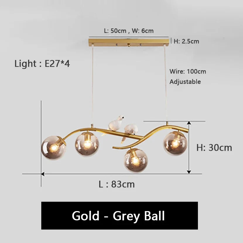 lustre en fer avec oiseau et boule de verre suspendue