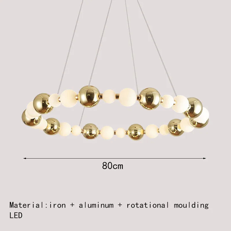 lustre led boule acrylique avec anneau doré et fils réglables