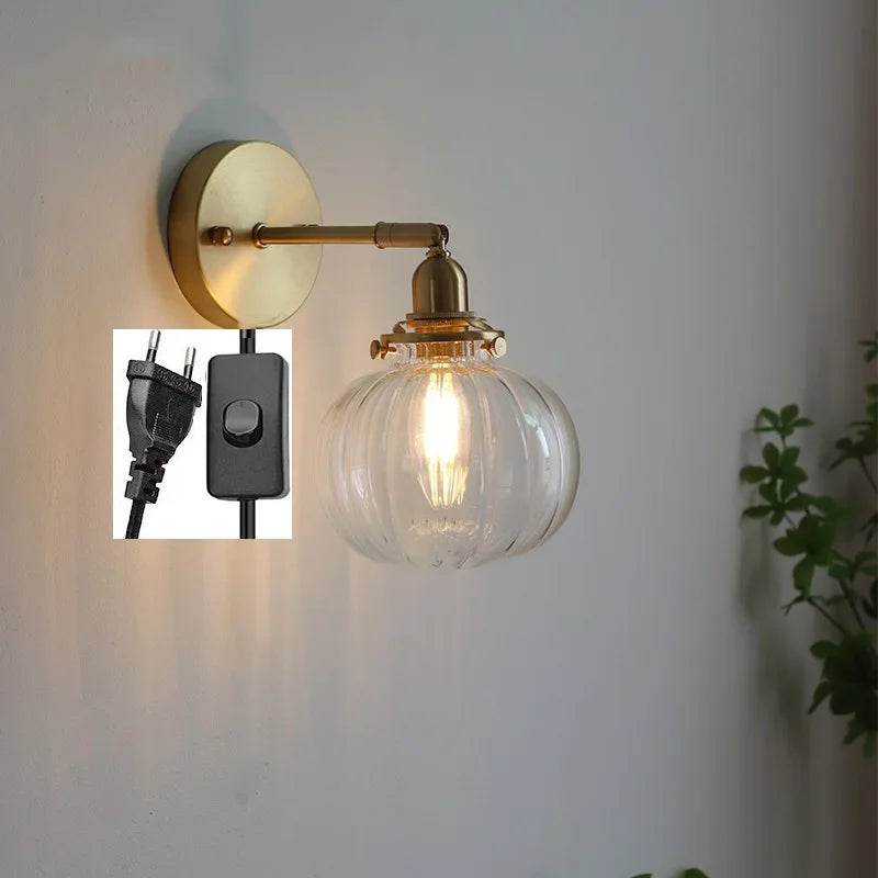 applique murale moderne avec chaîne de traction et boule de verre