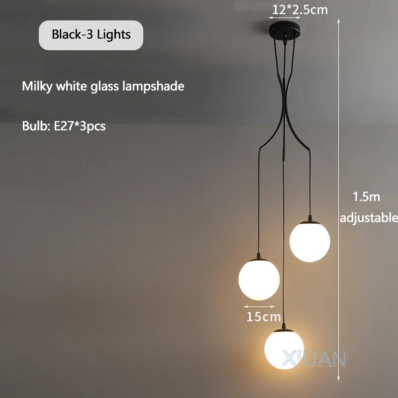 lustre nordique avec lampes de boule en verre laiteux suspendues
