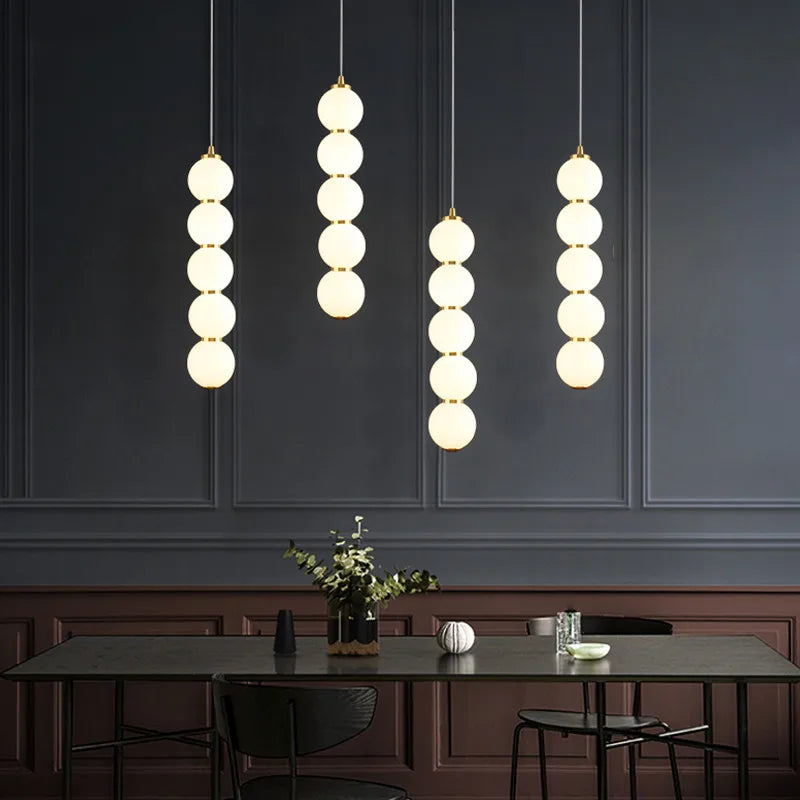 Suspension design à led boule verre or brillant