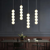 Suspension design à led boule verre or brillant