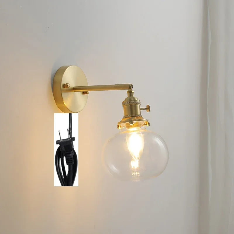 applique murale moderne avec chaîne de traction et boule de verre