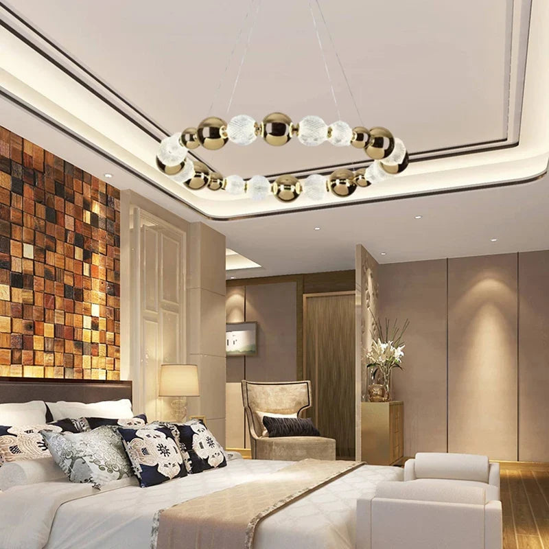 lustre led boule acrylique avec anneau doré et fils réglables