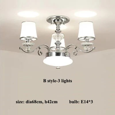 lustre chromé moderne à abat-jours blancs