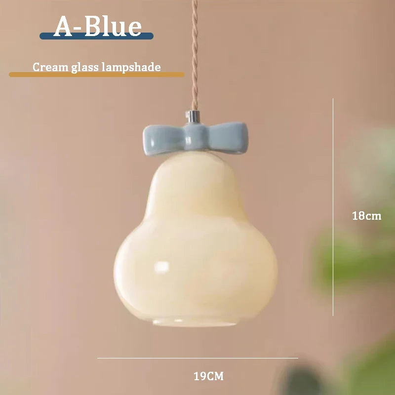 suspension en verre avec nœud rose pour chambre enfant