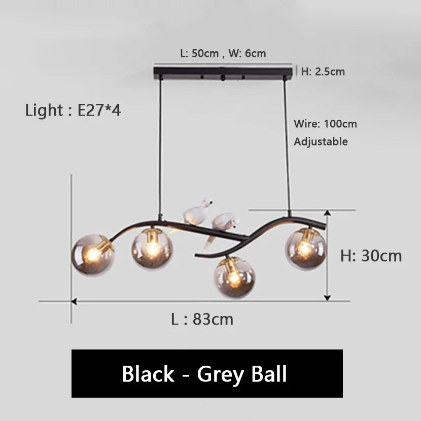 lustre en fer avec oiseau et boule de verre suspendue