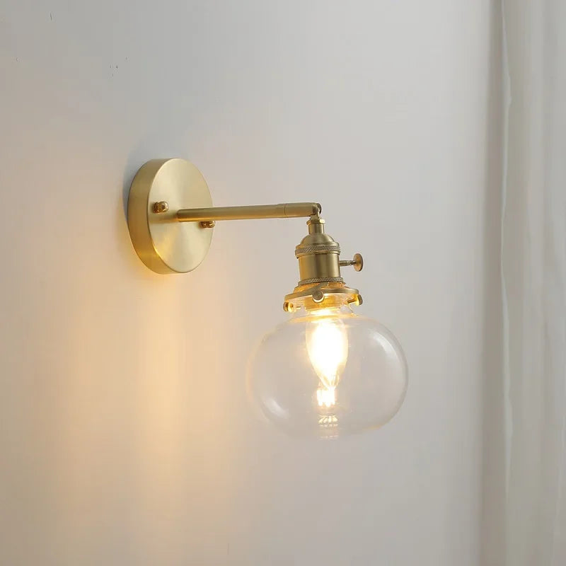applique murale moderne avec chaîne de traction et boule de verre