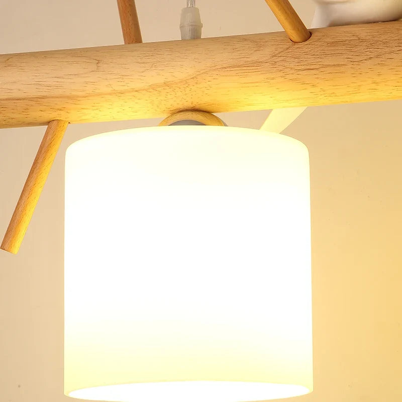 Lustre nordique en bois massif avec oiseaux