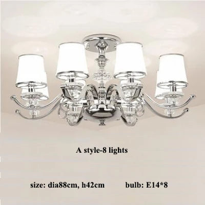 lustre chromé moderne à abat-jours blancs