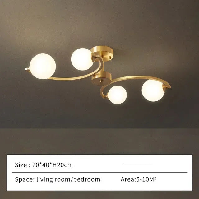 plafonnier moderne en cuivre doré avec boule de verre et led