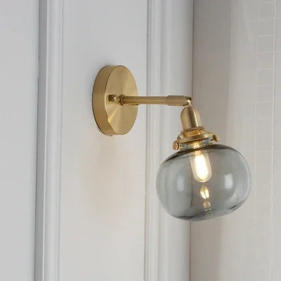 applique murale moderne avec chaîne de traction et boule de verre
