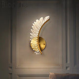 applique murale créative en forme d'aile dorée pour intérieur
