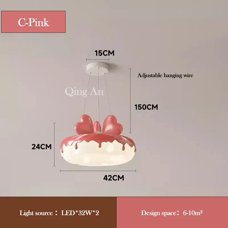lustre en forme de donut avec nœud rose pour décoration enfantine