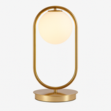 Lampe de chevet design en métal doré et boule en verre