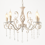 Lustre vintage en cristal et fer forgé pour un éclairage élégant