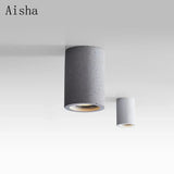 plafonnier rond en ciment led design minimaliste pour intérieur