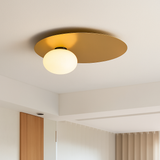 plafonnier rond en métal moderne avec ampoule en verre blanc