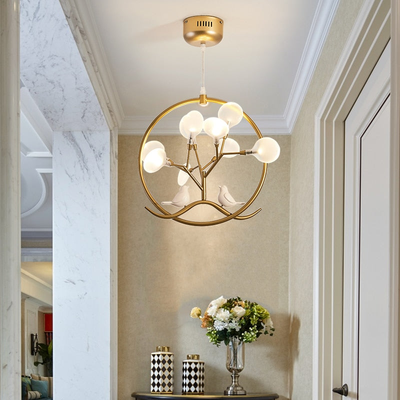 Lustre moderne avec arbre et oiseaux dans anneau Rhym