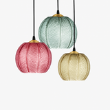 Suspension boule en verre motif feuilles