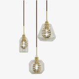 Suspension design en verre avec spirale dorée